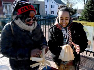 Pokanoket women show how to make a corn husk doll – Sowams